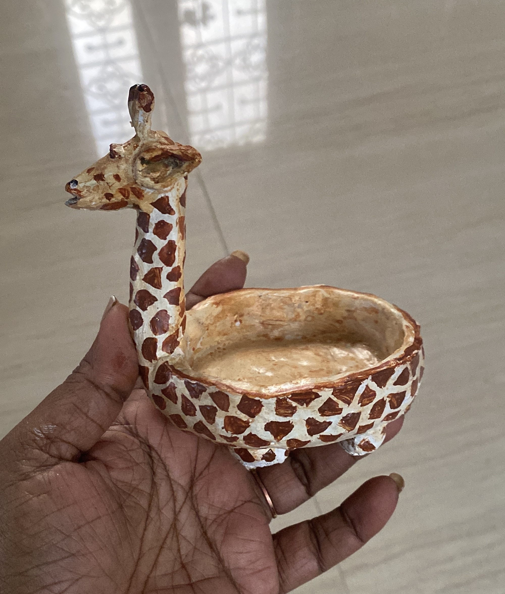 Handcrafted Giraffe - Reaching new heights with clay, one spot at a time. Created with love and attention to detail.